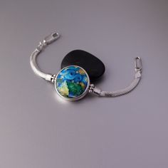 Circle Enamel Bracelet Cloisonne enamel Sterling silver Double-sided enamel bracelet Bracelet on silver chain Handmade enamel bracelet by CloisonneMinanqari on Etsy Elegant Hand Painted Bracelet, Sterling Silver Cabochon Bracelet As A Gift, Blue Wearable Art Bracelet, Unique Enamel Bracelets As Gift, Hand Painted Enamel Bracelets As Gift, Hand Painted Enamel Bracelets For Gifts, Silver Enamel Cabochon Jewelry, Hand Painted Silver Round Jewelry, Hand Painted Round Silver Jewelry