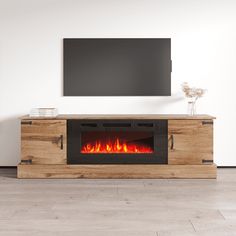 a television stand with a fireplace in the middle and a flat screen tv above it