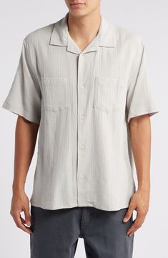 Rumpled and puckered like a well-loved favorite, this camp shirt made of soft cotton features a relaxed fit that's perfect for enjoying warm, sunny days. 29" length (size medium) Front button closure Notched collar Short sleeves Chest patch pockets 100% cotton Machine wash, line dry Imported Relaxed Fit Button-up Camp Shirt For Casual Gatherings, Relaxed Fit Camp Shirt With Johnny Collar For Vacation, Casual Relaxed Fit Button-up Camp Shirt, Relaxed Fit Shirt With Camp Collar For Casual Gatherings, Casual Relaxed Fit Short Sleeve Shirt With Spread Collar, Classic Camp Collar Tops For Beach, Casual Short Sleeve Shirt With Relaxed Fit, Classic Beach Tops With Camp Collar, Relaxed Fit Johnny Collar Shirt For Vacation