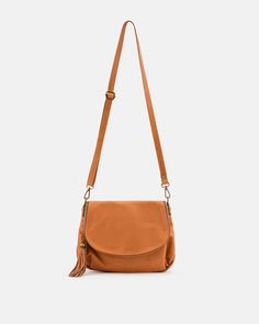 Beautiful in tan, the Vasarino crossbody leather bag is a glamorous piece that you should add to your wardrobe. Featuring a main compartment with a zippered closure, an internal zip pocket and a zip pocket at the back, this piece of art is made even more beautiful with bronze hardware and a tassel. Wear it using the adjustable strap and feel posh spice instantly.  20 cm high x 27,5 cm wide x 6 cm deep Adjustable shoulder strap (drop 60 cm) Matching stitching and bronze plated hardware Main compa Brown Saddle Bag With Zipper For Everyday Use, Everyday Crossbody Flap Bag With Zipper Closure, Daily Use Crossbody Flap Bag With Zipper, Daily Use Crossbody Flap Bag With Zipper Closure, Chic Cognac Shoulder Bag With Zipper Closure, Crossbody Saddle Bag With Zipper For Daily Use, Cognac Shoulder Bag With Adjustable Strap For Fall, Everyday Crossbody Saddle Bag With Zipper, Daily Use Crossbody Saddle Bag With Zipper