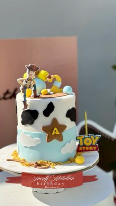 a toy story themed birthday cake on a table