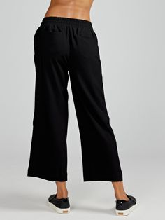 The Weekend Wide Leg Pant is your go-to choice for laid-back days. Crafted from lightweight fabric, it offers optimal comfort and freedom of movement. Its wide leg design ensures a relaxed fit, making it perfect for casual outings and leisurely strolls. With its versatility and effortless style, it's an essential addition to your wardrobe. It's also available with a longer 25" inseam. Wide-leg Yoga Pants With Pockets For Loungewear, Versatile Wide Leg Pull-on Pants For Loungewear, Comfortable Wide Leg Pants For Everyday, Versatile Wide Leg Pull-on Sweatpants, Versatile Wide-leg Bottoms With Relaxed Fit, Relaxed Wide-leg Pants With Comfort Waistband, Versatile Relaxed Fit Wide-leg Pants, Versatile Wide-leg Pants With Relaxed Fit, Everyday Athleisure Bottoms With Straight Hem