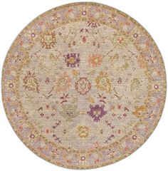 a round rug with many different colors and designs on the top, along with a white background