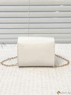 Bird in Bag - Stylish Solid Color Mini Crossbody Bag Featuring a Sleek and Modern Design Modern Crossbody Flap Bag With Gold-tone Hardware, White Crossbody Shoulder Bag With Gold-tone Hardware, White Crossbody Box Bag With Gold-tone Hardware, White Crossbody Shoulder Bag With Silver-tone Hardware, Pattern Composition, White Crossbody Bag With Silver-tone Hardware, Canvas Crossbody Bag, Mini Crossbody Bag, Mini Crossbody