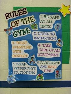 bulletin board with rules of the gym written on it in front of a classroom wall