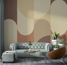 a living room scene with focus on the couch and chair, as well as an abstract wallpaper