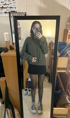 olive sweater mini skirt sheer tights converse fall jewelry aestheric cozy warm Converse Tights Skirt Outfit, Chelsea Boots And Tights, Tights And Mini Skirt Outfit, Converse And Tights, Sweater Tights Outfit, Tights Under Dress, Crewneck And Skirt Outfit, Mini Skirt Oversized Sweater, Sweater Over Skirt