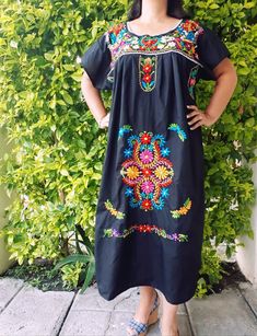 "FREE SHIPPING MEXICO, USA & CANADA Mexican embroidered black Dress Embroidered design and color may vary (see photos) *SPECIAL PACKAGE with Shawl or rebozo has 15% OFF than purchasing every item indivually YOU CAN CHOOSE ANY REBOZO COLOR WITH YOU DRESS - Please write in Order Note - We have more colors than the shown in photos Ideal for a boho and vintage chic look with Folk embroidered flowers, for everyday or beach. The colors are fantastic and the weave in the fabric give it the distinct Black Folk Style Beach Dress, Black Dresses For Cinco De Mayo Fiesta, Traditional Black Embroidered Beach Dress, Traditional Black Dress For Cinco De Mayo, Traditional Black Embroidered Dress For Beach, Black Embroidered Dress For Spring Fiesta, Black Bohemian Dress For Fiesta, Black Embroidered Summer Dress For Fiesta, Traditional Black Fiesta Dress