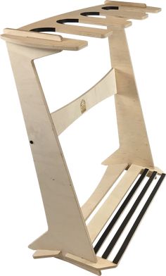 a wooden rack with four black and white bars