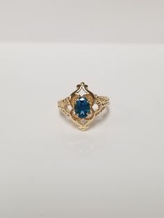 "Thanks for shopping our vintage estate store. We tend to sell well below wholesale and truly hope you enjoy all of our items. Many of the items are one of a kind, so please enjoy scrolling through the pictures and hopefully something will catch your eye. Brown spots are from camera or reflections. Estate 14k yellow gold natural blue 1ct oval topaz or aquamarine ring. Testing aquamarine, but looks like a darker blue topaz.  Ring size: 4.5 Setting:  3/8\" by 5/8\"  Band width: 2mm Weight: 3.61 gr Aquamarine Ring, Brown Spots, Aquamarine Rings, Blue Topaz Ring, Topaz Ring, Cocktail Rings, Rings Statement, Blue Topaz, Aquamarine