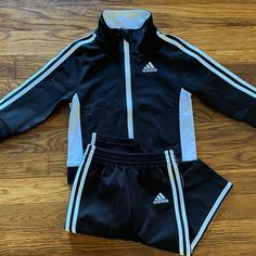 Nwot Adidas Black & White Striped Classic Adicolor Track Suit Jacket & Pants Unisex Boys Or Girls Size 18m. Tags Were Taken Off But It Was Never Worn. Absolutely No Flaws. Adidas Sports Set With Long Sleeve, Adidas Long Sleeve Playwear Sets, Adidas Winter Sets With Long Sleeve, Adidas Winter Long Sleeve Sets, Sporty Black Sets For Fall, Adidas Fitted Winter Sets, Winter Adidas Fitted Sets, Adidas White Long Sleeve Set, Adidas Cotton Sets For Winter