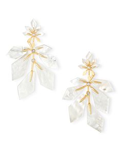 A true head turner, the Jaylin Gold Statement Earrings in Ivory Mother-of-Pearl are designed to impress. These statement earrings put our abstract petal shape on full display, with sparkling crystal accents that add a little something extra to what is already a work of art. Add that wow aspect to any outfit with the Jaylin Statement Earrings. Metal 14k Yellow Gold Over Brass Material Ivory Mother-of-Pearl Closure Ear Post Size 3.3"L X2.27"WDue to the one-of-a-kind nature of the medium, exact colors and patterns may vary slightly from the image shown. | Kendra Scott Jaylin Gold Statement Earrings in Ivory Mother-of-Pearl | Mother Of Pearl Formal White Gold Mother Of Pearl Earrings, Modern White Mother Of Pearl Earrings, Elegant Flower Shaped Mother Of Pearl Earrings, Rose Gold Statement Earrings, Elegant Flower-shaped Mother Of Pearl Earrings, Elegant Shell-shaped Mother Of Pearl Earrings, Lauren Kay Sims, Ivory Earrings, Kendra Scott Earrings