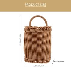 the size and measurements of a wicker basket with handles on each side is shown