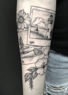 a person with a tattoo on their arm that has pictures and flowers around it,