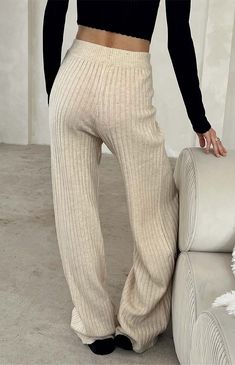 Comfort meets cozy chic in the new Montana Ribbed Knit Pants from Princess Polly. These classic high-waisted pants have a soft ribbed knit fabrication with an elasticized waistband, wide leg openings, and a relaxed fit. 

Sizing: XXS (US 0 / AU 4), XS (US 2 / AU 6), SML (US 4 / AU 8), MED (US 6 / AU 10), LRG (US 8 / AU 12), XL (US 10 / AU 14), XXL (US 12 / AU 16)


	Unlined
	Good stretch 
	Ribbed knit fabric
	Wide leg openings
	Relaxed fit
	Elastic waistband
	33% recycled polyester, 31 Ribbed Pants Outfit, Wide Leg Pants Winter, Ribbed Knit Pants, Ribbed Pants, Womens Loungewear Sets, Pants Cream, Cream Outfits, Knitwear Outfit, Cream Pants