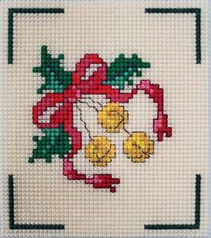 a cross stitch pattern with bells on it