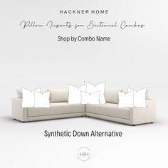 a white couch with pillows on it and the words, synthetic down alternative written in black