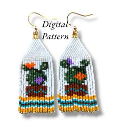 a pair of beaded earrings with flowers on them