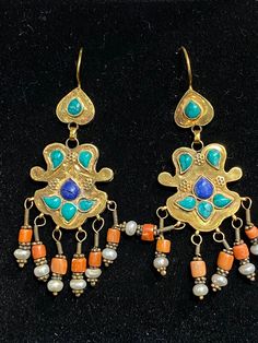 Beautiful Unique tribal gold earring with turquoise and Lapis lazuli 16k Traditional Blue Brass Earrings, Traditional Yellow Gold Multi-stone Earrings, Unique Blue Jewelry For Ceremonial Occasion, Unique Blue Ceremonial Jewelry, Traditional Blue Pendant Earrings, Traditional Turquoise Gemstone Earrings, Traditional Blue Brass Jewelry, Traditional Turquoise Earrings With Natural Stones, Bohemian Yellow Gold Earrings With Gemstone