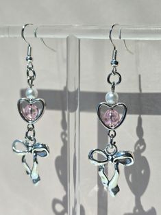 Approx. length: 1.5" inches Discover our whimsical & dreamy earring collection. Handmade with quality material and made to last. Your Orders Make Our Day! Elegant Pink Heart Metal Earrings, Heart-shaped Cute Jewelry With Matching Earrings, Feminine Dangle Heart Earrings For Valentine's Day, Metal Dangle Earrings For Valentine's Day, Silver Heart Earrings For Party, Feminine Earrings For Valentine's Day Party, Cute Heart-shaped Pierced Jewelry, Cute Metal Jewelry For Valentine's Day, Handmade Metal Earrings For Valentine's Day