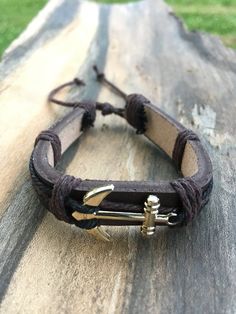 Brown Leather Bracelet for men, Men's Jewelry Gift, Handmade leather Bracelet, Gold Boat Anchor O4M-B63Sign-up now for our Newsletter and receive a 10% Discount on your first order!https://mailchi.mp/7f649f87eb6c/only4men-newsletterThis is a beautiful piece of jewelry, a unique and original Gift for Him! The Gold Boat Anchor Bracelet length is about 8 inches.This will fit most wrist sizes, but please make sure before you order this will fit your wrist size.The closure system is a toggle type, ve Casual Leather Strap Bracelets As Gift, Adjustable Brown Wristband For Father's Day, Leather Bracelet For Men, Father Christmas Gifts, Handmade Leather Bracelets, Brown Leather Bracelet, Boat Anchor, Wood Sunglasses, Anchor Bracelet