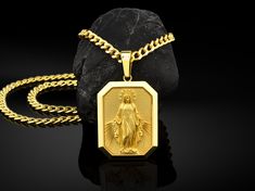 Your solid gold Miraculous Virgin Mary Medallion is stylish and pretty ideal for everyday use. Engraving details of handmade solid gold necklace are very detailed and eye-catching. This meaningful necklace with high quality handwork will be a legacy you can leave to your family with its quality ★Item Details * Material : 10K & 14K & 18K Solid Gold * Chain Model : 3,75mm Solid Gold Cuban Chain * Pendant Weight : 10K = 08.20 Grams 14K = 09.90 Grams 18K = 11.40 Grams * Chain Weight : 14K = Spiritual Yellow Gold Necklace With Miraculous Medal, 14k Gold Miraculous Medal As Gift, 14k Gold Miraculous Medal As A Gift, Yellow Gold Miraculous Medal As Gift, Gold Crucifix Jewelry For Commemoration, Gold Virgin Mary Medallion Charm, Gold Virgin Mary Medallion Jewelry, Gold Virgin Mary Medallion, Gold Medallion With Virgin Mary