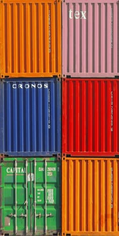 several multicolored shipping containers stacked on top of each other