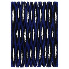 an abstract blue and black rug with white lines on it, against a white background