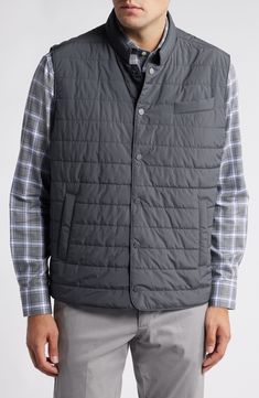 Comfortable and versatile, this classic puffer vest features magnet-secured front pockets and a lightweight feel that layers over or into your favorite cool-weather looks. Front snap closure Stand collar Chest welt pocket; front snap-welt pockets; interior zip pocket Lined, with fill 100% polyester Dry clean Made in Turkey Casual Sleeveless Puffer Jacket With Pockets, Casual Nylon Vest With Functional Pockets, Casual Sleeveless Puffer Jacket, Classic Sleeveless Outerwear For Outdoor, Casual Cold Weather Vest With Pockets, Gray Casual Vest With Pockets, Functional Vest With Pockets For Cold Weather, Casual Gray Vest With Pockets, Casual Winter Vest With Functional Pockets