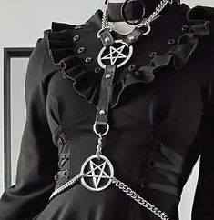 Gothic Punk Pentagon Harness Silvery Chain Neck To Waist 16.5" Length 17" To 38" Waist.

12" To 22" Neck Black.

Brand New Punk Style Necklaces For Halloween Concert, Punk Necklaces For Halloween Concert, Punk Necklace With Adjustable Chain For Halloween, Alternative Necklaces For Halloween Concert, Alternative Halloween Necklaces For Concerts, Punk Style Metal Necklace For Cosplay, Punk Metal Necklaces For Cosplay, Punk Metal Necklace For Cosplay, Grunge Necklaces For Halloween