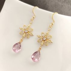 Gorgeous Kunzite Cross Earrings, perfect as a birthday gift for your wife. Handmade with Faceted Kunzite Teardrop Beads, 14K Gold Plated Cubic Zirconia Cross Connectors and ear hooks. Nickel free, suitable for sensitive skin. Measurements --------------------- Main stone dimensions (height x width x depth): 1.2 x 0.8 x 0.5 cm / 0.47 x 0.31 x 0.2 inches Total Length: 5.3 cm / 2.1 inches * Please allow 0.1 - 0.5 cm difference due to manual measurement.  Weight: Approx. 2 g / 0.07 oz. each side Not Elegant Dangle Jewelry For Mother's Day, Elegant Gemstone Crystal Earrings For Anniversary, Elegant Dangle Crystal Earrings For Gift, Pierced Yellow Gold Crystal Earrings As Gift, Yellow Gold Pierced Crystal Earrings For Gift, Gold Crystal Earrings With Elegant Design For Gift, Yellow Gold Pierced Crystal Earrings As Gift, Elegant Drop Earrings For Mother's Day, Elegant Birthstone Earrings For Wedding