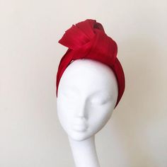 Last order for Royal Ascot is 12th June 2019. Free UK shipping now!Beautifully knotted silk abaca turban, ideal for summer season, bright, stylish, light, and feels like breath of fresh air, feminine with modern edge. It made in high quality silk abaca, with beautiful colour and subtle silk sheen, naturally luxury.It is kind of grab-and-go stylish headpiece that so easy to wear, dress up or dress down!Silk Abaca is a luxury material made of a combination of silk and fibers from the abaca tree (p Red Adjustable Headwrap For Party, Elegant Summer Headwrap, Red Pinched Crown Headpiece, Adjustable Party Turban, Elegant Red Fitted Headwrap, Red Structured Crown Headpiece For Party, Elegant Adjustable Turban For Party, Elegant Summer Headwrap Hat, Elegant Adjustable Red Turban