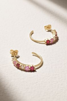 Jennifer Meyer's earrings are like candy for your ears. Cast from polished 18-karat gold in an open hoop, they’re set with round-cut diamonds, pink sapphires and rubies. Stack yours with dainty studs for an easy everyday look. Yellow Gold Gemstone Huggie Earrings, Luxury Round Gemstone Hoop Earrings, Luxury Round Hoop Earrings With Gemstones, Diamond Gemstone Hoop Earrings, Fine Jewelry Small Hoop Gemstone Earrings, Gemstone Hoop Earrings Fine Jewelry, Pink Hoop Earrings Fine Jewelry, Fine Jewelry White Gold Hoop Earrings With Gemstone, Fine Jewelry Yellow Gold Round Cut Hoop Earrings