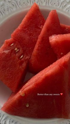 slices of watermelon on a white plate