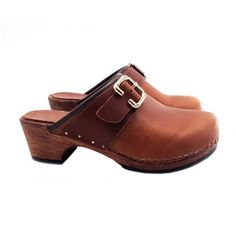 HANDMADE CLOGSwood-effect clogs made in italy-Brown leather upper with buckle-anti-slip sole-heel 5 cm-Designed and Manufactured by "MY CLOGS"DON'T FORGET TO CHECK THE SIZE BEFORE YOU COMPLETE THE ORDER!Size and LENGTH OF THE SHOE ALONG THE CURVE:35 EU  =  22.00 CM36 EU  =  22.50 CM37 EU  =  23.00 CM38 EU  =  23.50 CM39 EU  =  24.00 CM40 EU  =  24.50 CM41  EU  =  25.00 CM Leather Mules With Wooden Heel And Closed Toe, Leather Slip-on Mules With Tang Buckle, Leather Mules With Tang Buckle And Round Toe, Leather Slip-on Clogs With Buckle Closure, Leather Closed Toe Clogs With Rubber Sole, Brown Leather Clogs With Buckle Closure, Brown Closed Toe Clogs With Removable Insole, Brown Leather Mules With Buckle Closure, Brown Leather Sole Slip-on Clogs