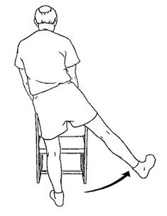 a person sitting on a chair with their legs crossed