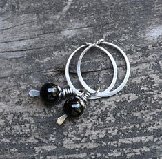 "🌟PLEASE READ the following description before making your purchase.  Note measurements and size reference photos. ½\" sterling silver hoops with removable 6mm black onyx sterling silver dangles. These earrings measure 1.3 inches from the top of the hoop to the bottom of the dangle." Handmade Small Hoop Earrings, Nickel-free Small Hoop Sterling Silver Earrings, Small Hoop Nickel-free Sterling Silver Earrings, Nickel-free Small Hoop Earrings In Sterling Silver, Small Hoop Sterling Silver Nickel-free Earrings, Small Hoop Handmade Earrings As Gift, Black Sterling Silver Small Hoop Earrings, Handmade Minimalist Small Hoop Earrings, Dainty Handmade Small Hoop Earrings