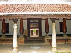 an old building with columns and pillars