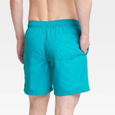 Be ready for warm summer days by the water with these Swim Trunks from Goodfellow & Co™. These men’s swim trunks feature a solid hue and above-the-knee length for the perfect waterside look. A front drawstring with an adjustable waist helps you find the perfect fit every time you wear them, while UPF 50+ sun protection helps ward off harmful sun rays. Whether you’re hanging out on the shore or by the pool, these men’s swim trunks are perfect for all your waterside adventures. 100% Satisfaction G Swimming Classes, Bf Love, Mens Swim Trunks, Comfy Shorts, Sun Rays, Teen Boy, Swimwear Fashion, Above The Knee, Swim Trunks