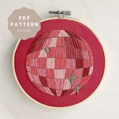 an embroidery project with a hot air balloon in the middle and text overlay that reads, pdf pattern & guide