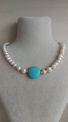 Beaded necklace is an excellent and elegant gift for your lovelies. Turquoise and pearlnecklace is made of turquoise bead, freshwater pearl and gold plated dorika apparatus. You can wear the turquoise necklace to a wedding party and look very special. Freshwater pearl necklace is a nice Christmas gift, Valentine's Day gift, wedding gift, birthday gift, bridesmaid gift and other special day gift for her. Your pearl jewelry will be put in a nice tulle sachette. Elegant Beaded Turquoise Necklace Gift, Elegant Handmade Turquoise Necklace With Round Beads, Turquoise Pearl Necklace With Natural Stones, Elegant Turquoise Necklace With Round Beads As Gift, Turquoise Pearl Necklace With Gemstone Beads, Elegant Turquoise Necklace With Round Beads For Jewelry Making, Turquoise Round Beads Pearl Necklace With Natural Stones, Turquoise Pearl Necklace As A Gift, Elegant Single Strand Turquoise Beaded Necklaces