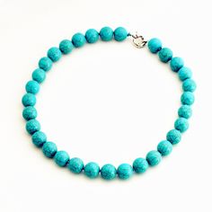 This design is simple, classic, elegant, fit for any occasion such as daily wearing home and office. It's carefully packed in beautiful jewelry box making it perfect for gift giving on valentines day, Christmas, Birthdays, Anniversaries or simply because you're thinking of someone special. Material: Turquoise bead Bead size:16mm/0.629 inch Necklace size: 18 inch (Neck size 18 inches) Color: turquoise Packing: Beautiful Pouch All items in my shop are made to order. Most of the time it takes 1-3 b Elegant Turquoise Necklace With Polished Beads For Gift, Elegant Turquoise Necklace With Polished Beads As Gift, Turquoise Single Strand Necklace With Round Beads For Gifts, Turquoise Single Strand Necklace With Round Beads, Turquoise Necklace With Round Beads As A Gift, Elegant Turquoise Necklace With Round Beads As Gift, Elegant Turquoise Jewelry With 8mm Beads, Turquoise Beaded Necklace For Gift, Turquoise Round Beaded Necklace For Gifts