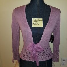 #547 Nwt Nicole By Nicole Miller Purple Knit Eyelet Bow Cardigan S Not Lined Sequins. All Of My Items Are From Smoke And Other Smells Free Environment. Measurements Are In The Pictures. All Reasonable Offers Will Be Considered. Dummy That The Item(S) Is Displayed On Approximated Measurements (Around = Circumferences). Bust 34.25" Waist 26" Hips (Bottom Of The Dummy) 35.25" 23" Long (From The Nape Of The Neck To The Bottom) Contents And Details As Pictured. All Measurements Are Approximate. Elegant Purple Sweater For Spring, Elegant Spring Purple Sweater, Chic Fitted Purple Cardigan, Elegant Purple Fall Cardigan, Purple Fitted Cardigan For Fall, Fitted Purple Cardigan For Fall, Spring Fitted Purple Cardigan, Purple Fitted Cardigan For Spring, Fitted Purple Cardigan For Spring