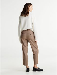 Tommy Hilfiger women's pant. Smarter looks call for a timeless foundation, and these checked pants fit the bill with their slim, straight-leg silhouette.  Material: 63% Recycled Polyester, 34% Viscose, 3% Elastane. Business Casual Tapered Leg Houndstooth Pants, Classic Houndstooth Pattern Bottoms, Business Casual Houndstooth Tapered Leg Bottoms, Tapered Leg Houndstooth Pattern Bottoms For Business Casual, Tapered Leg Houndstooth Bottoms For Business Casual, Classic Plaid Bottoms For Office, Classic Plaid Office Bottoms, Classic Tommy Hilfiger Tapered Leg Bottoms, Tommy Hilfiger Classic Tapered Leg Pants