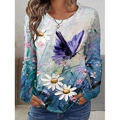 Category:Long Sleeve T-shirt; Season:Spring,Fall; Fabric:Polyester; Sleeve Length:Long Sleeve; Look After Me:Machine wash,Washable,Wet and Dry Cleaning; Gender:Women's; Style:Casual; Elasticity:Micro-elastic; Tops Type:T Shirt; Occasion:Daily; Top Length:Regular Tops; Fit Type:Regular Fit; Pattern:Floral,Butterfly; Design:Print; Neckline:Crew Neck; Brand:Shall We; Listing Date:08/21/2024 Blue Long Sleeve T-shirt With Floral Print, Blue Floral Print T-shirt For Fall, Kids Tree Ornaments, Blue Spring, Kids Ornaments, Blue Springs, Women's T Shirts, Fall 2024, Spring And Fall