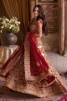 Red Bridal Lehenga and Choli Pakistani Wedding Dress is a stunning masterpiece adorned with Embroideries, Motifs, Sequins, and Goldwork. Fast shipping. Bridal Lehenga Pakistani, Red Bridal Lehenga, Pakistani Bridal Lehenga, Red Lehenga Choli, Pakistani Bridal Dress, Raw Silk Lehenga, Bridal Dupatta, Bridal Lehenga Red, Pakistani Wedding Dress