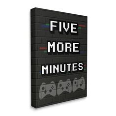 a black and white poster with the words five more minutes on it, next to two video game controllers