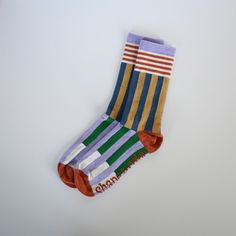 Meet the new ribbed knit statement crew socks! Made in the USA! Proudly manufactured in North Carolina, USA. Materials: 54% recycled cotton, 33% recycled polyester, 8% nylon, 5% rubber based elastic. Care: Machine wash cold on gentle cycle, tumble dry low. Sizing: Fits women's size 5.5 -9, men's size 4-7.5 Retro Socks, Statement Socks, Funky Socks, Retro Stripes, Yellow Stripes, Dream Wardrobe, Yellow Blue, Recycled Cotton, Knitting Socks