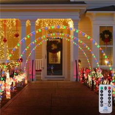 christmas lights decorate the front yard of a house