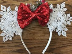 a red and white minnie mouse ears with snowflakes